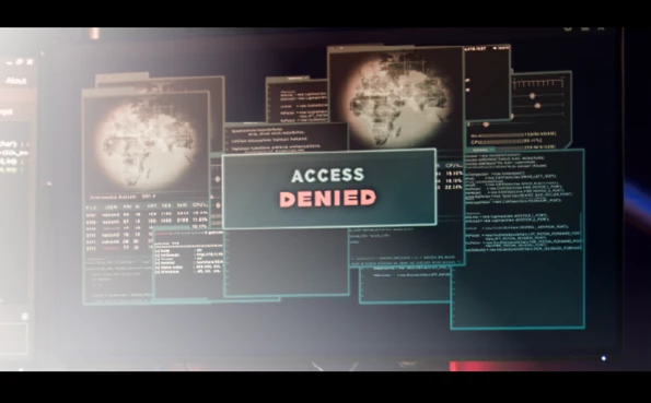 Computer interface with multiple strings of code and a central security block message, symbolizing intrusion prevention in cybersecurity.