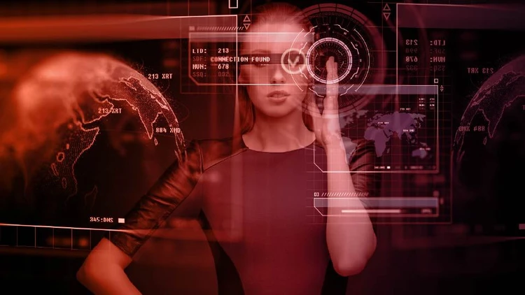 Woman using a holographic interface to manage data and cloud connectivity, offering a futuristic representation of artificial intelligence.